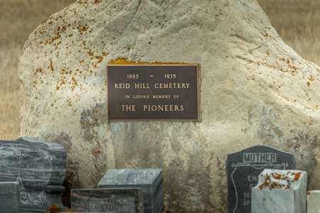 Pioneer cemetaries sir along the road side as remiders of the past Vulcan County Alberta Canada
