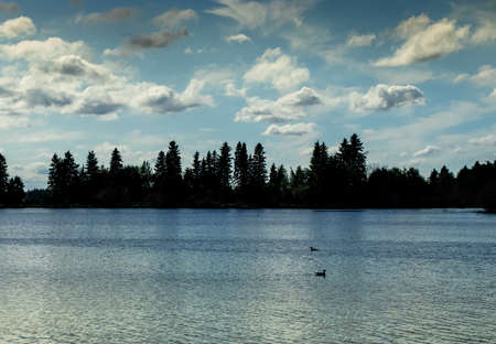 Astonia Lake under blue skies Elk Island National Park Alberta Canada