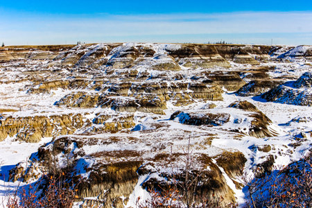 Snow starts to melt in Horseshoe Canyon, Drumheller, Alberta, Canadaの写真素材