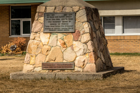 Cenotaph stands by the school in memorium. Bowden, Alberta, Canadaのeditorial素材