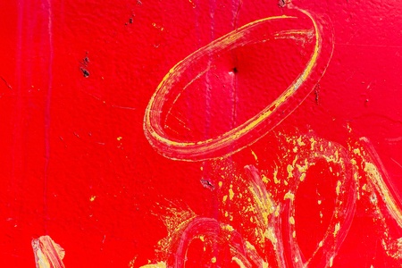 Close up of red metal texture with yellow paintの写真素材
