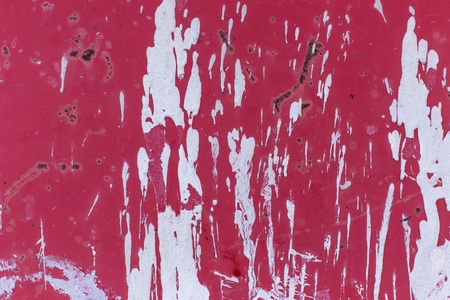 Texture of paint splashes on red metalの写真素材