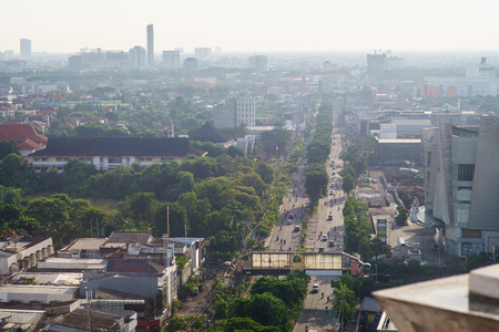 bird view over city on sun rise in Surabaya, Indonesia
