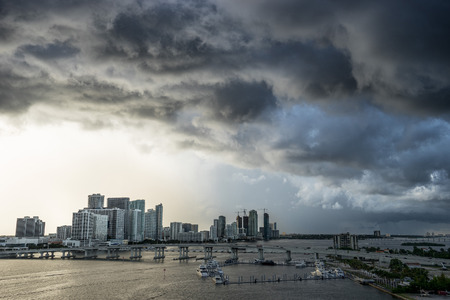 Miami Florida at storm with sunset. View of the big dark clouds and strong gale from the sea