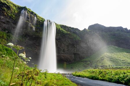 Beautiful waterfall of Seljalandsfoss in the summerの写真素材