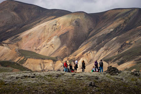 August of 2019. Landmannalaugar Valley. Iceland. Many tourist visiting Colorful mountains on the Laugavegur hiking trail. The combination of layers of multi-colored rocks, minerals, grass and mossのeditorial素材