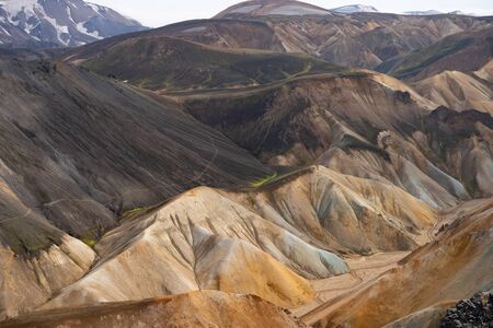 Landmannalaugar Colorful mountains on the Laugavegur hiking trail. Iceland. The combination of layers of multi-colored rocks, minerals, grass and mossの写真素材