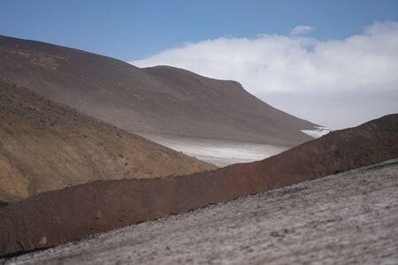 Volcanic landscape with glacier, rocks and ash on the Fimmvorduhals hiking trail. Iceland.の写真素材