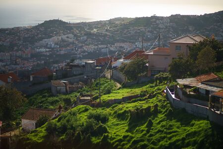 A view of across the roof tops of Funchal, Madeira from the chair lift up the hill behind the city.