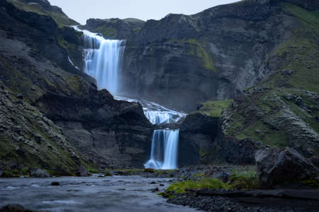Two-tiered waterfall Ofaerufoss in the Eldgja canyon, in the central Icelandの写真素材