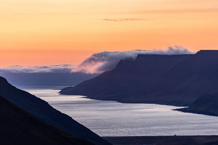 Summer dramatic sunset in the westfjords of Iceland.の写真素材