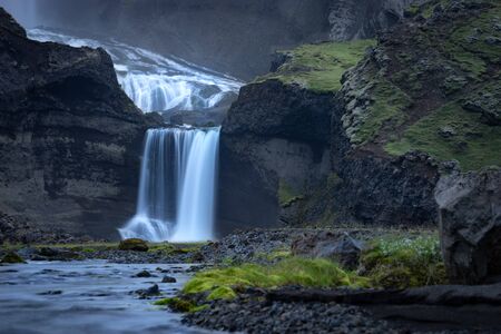 Two-tiered waterfall Ofaerufoss in the Eldgja canyon, in the central Icelandの写真素材