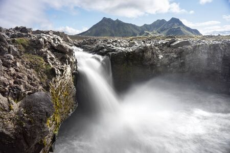 Smooth Waterfall over river Innri-Emstrua. Laugavegur hiking trail.の写真素材