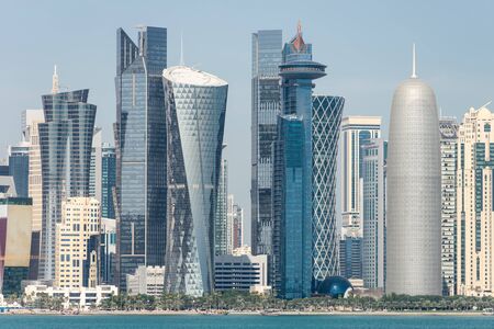 View of city center with skyscrapers from the other side of sea in Doha, Qatarの写真素材