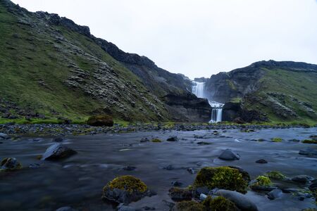 Two-tiered waterfall Ofaerufoss in the Eldgja canyon, in the central Icelandの写真素材