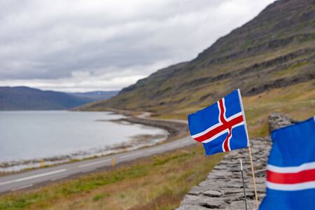Iceland, on the road, rocks, icelandic flag, mountains, rocks.の写真素材