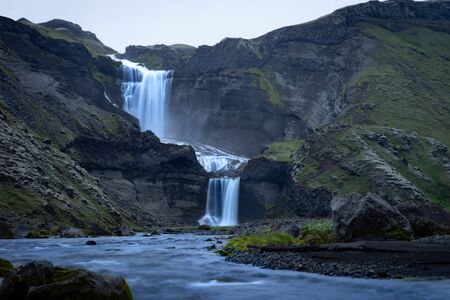 Two-tiered waterfall Ofaerufoss in the Eldgja canyon, in the central Icelandの写真素材