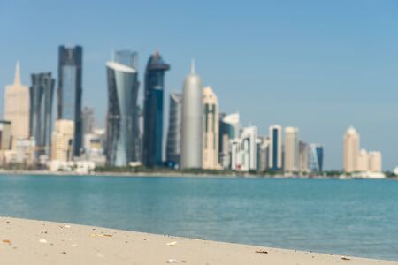 View of city center with skyscrapers from the Beach in Doha, Qatarの写真素材