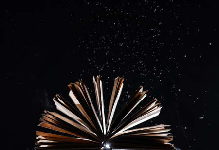 Bewitched Book With Magic Glows In The Darknessの写真素材