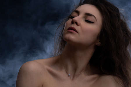 Portrait of excited sensual sexy woman with eyes closed.の写真素材