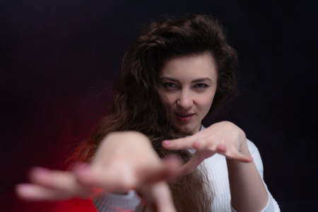 Happy, curly, smiling, Self-Assured Woman On Isolated Background.の写真素材