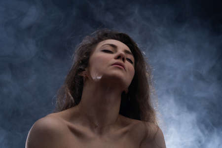Portrait of excited sensual sexy woman with eyes closed.の写真素材