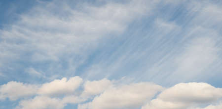 Panoramic fluffy cloud in the blue sky with copyspaceの写真素材