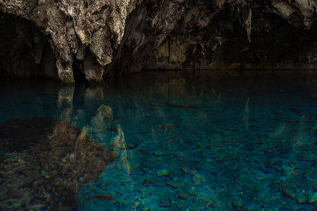 Lake in the cabe of blue clear and calm water with reflection. Travel and adventure conceptの写真素材