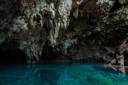 Lake in the cabe of blue clear and calm water with reflection. Travel and adventure conceptの写真素材