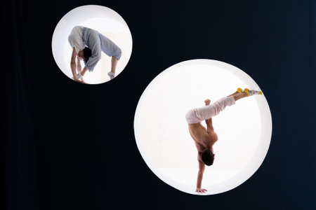 Flexible woman and man doing stretching and handstand in studio. Concept of willpower, motivation...