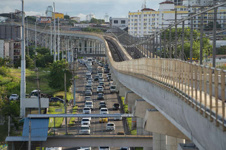 Metro bridge and traffic jam on highway in Panama City. Transportation conceptの写真素材