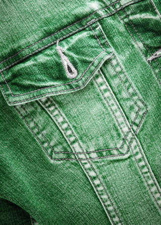 closeup detail of  green vintage denim jacket の写真素材