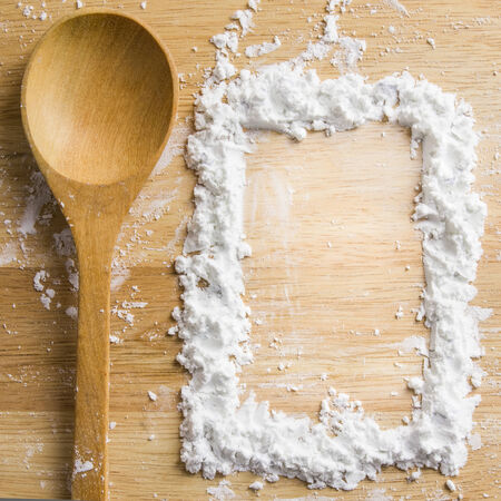 wooden spoon with square shape flourの写真素材