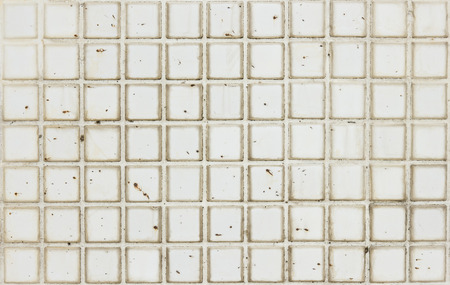 Old white square tiles texture for background.