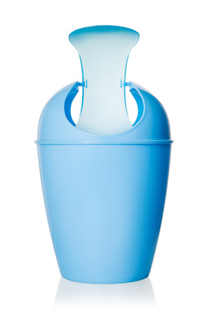 Small blue plastic bin isolated on white background.の写真素材
