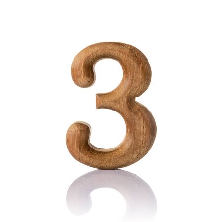 wooden numeric with shadow isolated on white background, number three,3.の写真素材