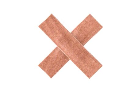 Sticky fabric plaster first-aid equipment isolated on white background.