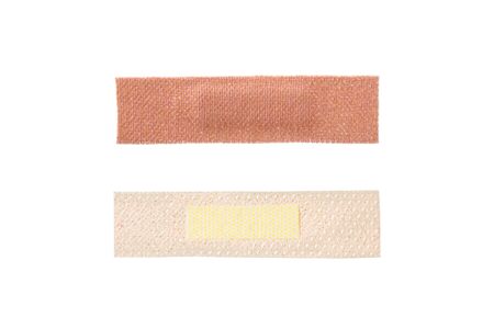 Sticky fabric plaster first-aid equipment isolated on white background.