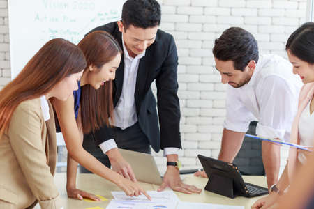 close up of Diverse and Asian business people brainstorm meeting Strategy, Planning, new business...