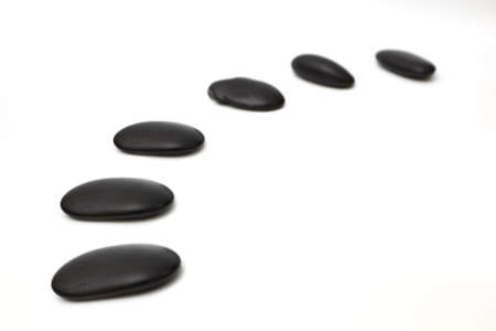 Row pebbles. Sea stones. It is isolated on a white backgroundの写真素材