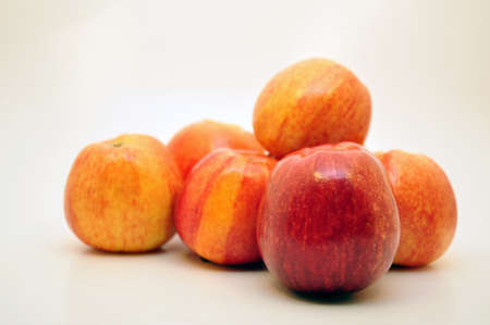 Stack of apples on a light backgroundの写真素材