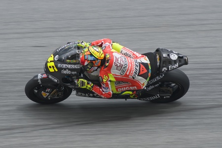 SEPANG, MALAYSIA - MARCH 1: Italian Valentino Rossi of Ducati Team takes a corner at the 2nd MotoGP testing on March 1, 2012 in Sepang, Malaysia. のeditorial素材