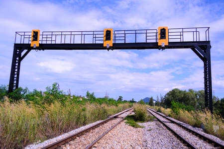 Two railroad and railroad sign