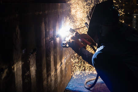 Welding work at night in the strait.