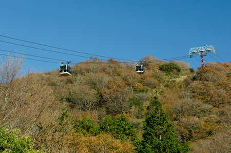 Cable car and leaves begin to change colorの写真素材