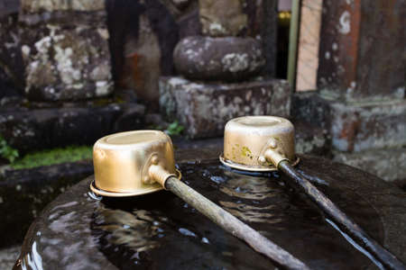 Water for wash before entering the shrine by Japanese traditionの写真素材