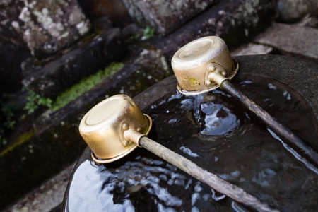 Water for wash before entering the shrine by Japanese traditionの写真素材