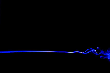 The light trails resemble smoke that moves back and forth, like waves and like an explosion.の写真素材