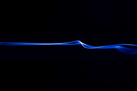 The light trails resemble smoke that moves back and forth, like waves and like an explosion.の写真素材