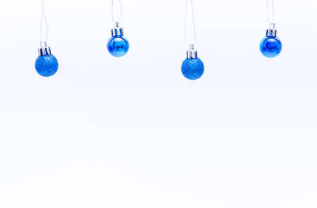 Blue Christmas Tree Ball on white backgroundの写真素材